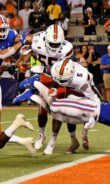 No. 8 Florida survives Miami 24-20 in season opener